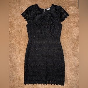 Francesca’s black dress size small and never worn! Pretty lace detail all over.